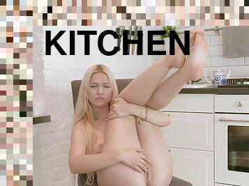 Sexy blonde Jessica Alessandra caresses her pussy in the kitchen