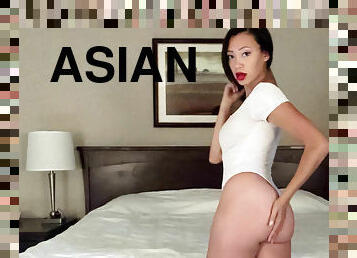 Asian minx Madi Laine masturbates in bed