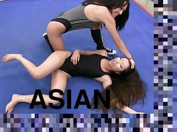 Two naughty Asian chicks catfight