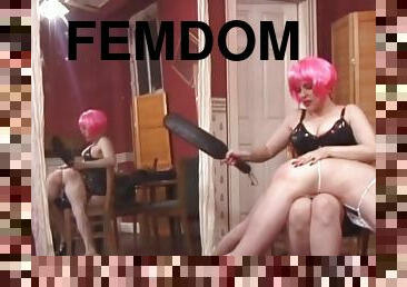 Pink haired mistress dominate slave in dungeon