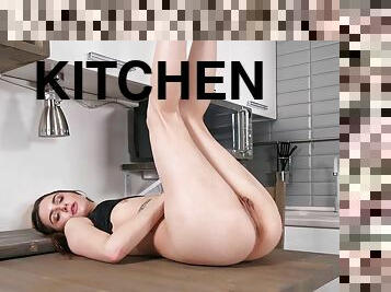 Solo Lika B moans while pleasuring her pussy in the kitchen