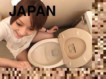 Japanese nurse Ria Sakurai drops on her knees to suck a dick