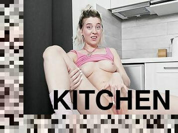 Solo Aurora B playing with her dripping cunt in the kitchen