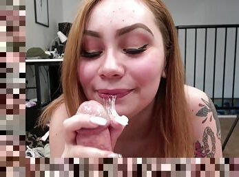 Close up POV video of a redhead babe swallowing cum after a blowjob