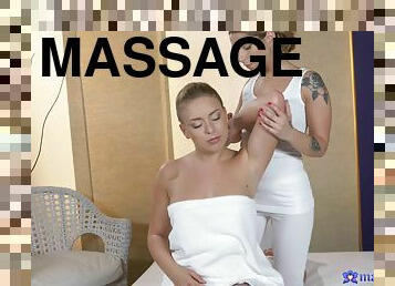 Massage by a sexy blonde leads to passionate lesbian lovemaking