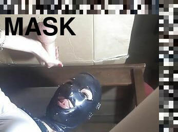 Dirty slave girl with a mask knows how to milk a stiff pecker