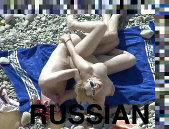 Russian couple fuck on the beach