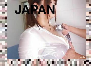Japanese hottie Kojima Miwa drops her bra to show her large boobs