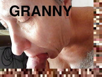 Gray-haired old lady sucks cock