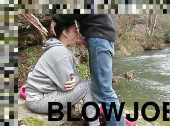 Deep blowjob by the river