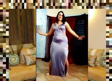 Chubby Egyptian woman dancing