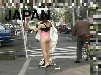 Slutty Japanese model drops her clothes to flash in the public