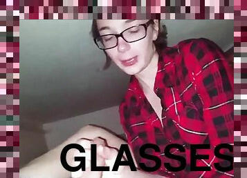 Hot slutty teen girlfriend with glasses giving a blowjob to her guy
