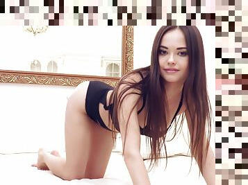 Cutie Li Moon spreads her long legs to give you a closer look