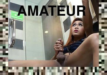 Amateur Asian shemale Adele is in the bathroom.