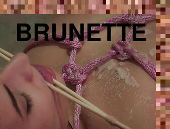 Tied up kinky brunette teen gets tortured with hot wax and toys