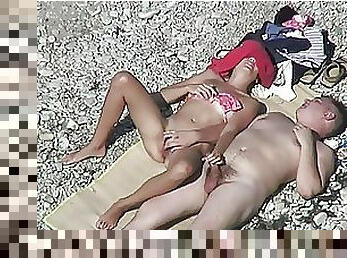 Hot Couple Stimulating Each Other on a Nude Beach