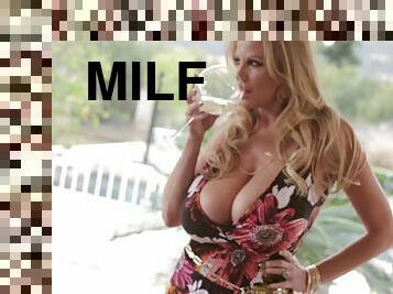 Kelly Madison enjoys a glass of wine and a masturbation game
