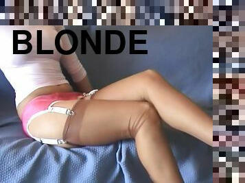 Stunning blonde Simone likes to walk around the house in stockings