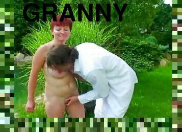 Redhead granny fucked in a backyard by a handsome man