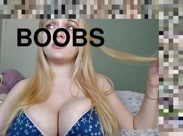 Hot blonde showing off cute big boobs