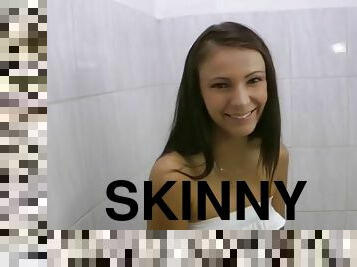 Skinny teen has sex in a public restroom