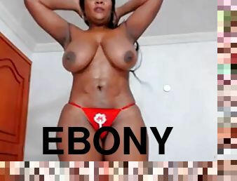 Ebony Beauty with Big Tits spreads pussy