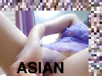 Horny Asian girl touches herself