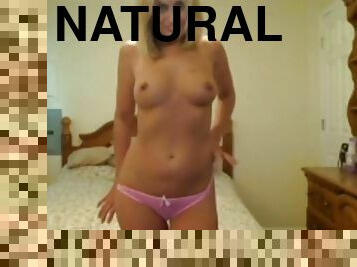 Sexy hot blonde babe stripteasing and shows off her tight shaved pussy on webcam