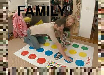 Twisted stepfamily playing twister