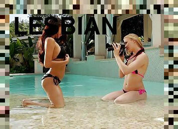 These two sexy girls swim in the pool naked then hook up