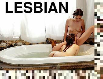 Two hotties gets in the tub then lick each other's pussies