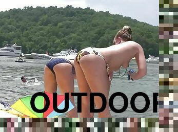 Some crazy chicks lick tits and flash pussies in reality outdoor clip