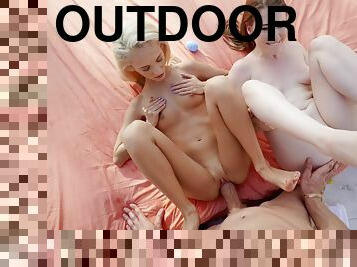 Alice Merches and Sadie Hartz pleasuring horny stud outdoors