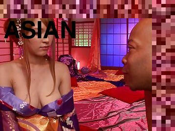 Crafty Asian cowgirl with natural tits moans while getting fucked by a bbc in a interracial shoot