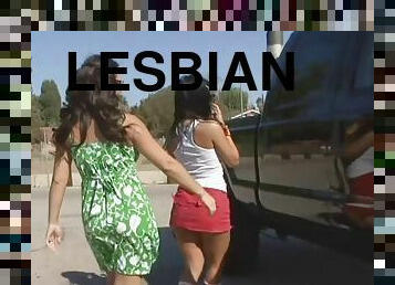 Brunette lesbian in miniskirt smashing her babe pussy using massive strap on