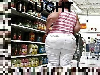 Chubby big-assed woman gets caught on a voyeur's cam in a supermarket