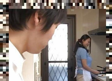 A very good Japanese wife cooks him dinner and gives a handjob