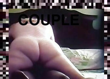 Blurry homemade video of a chubby couple fucking on a bed