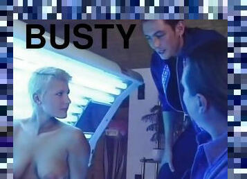 Busty blonde girlfriend sucks and fucks in a solarium