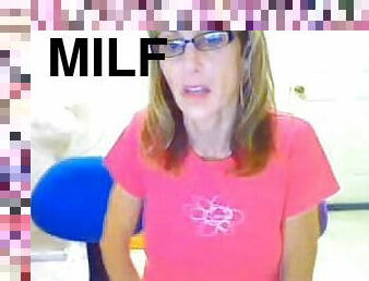 Blond milf wearing glasses masturbates her pussy in webcam solo clip