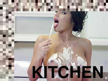 Candace Leilani smears her body with whipped cream in the kitchen