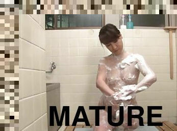 Mature Japanese slut Yuuri Saejima masturbates her cunt in a bathroom