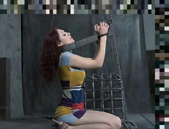 Chained Holly Wildes refined using gigantic toy in BDSM