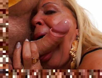 Ris Dar greedily taking a curved upwards cock into her mouth and ass