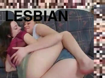 Two lesbians caress each other and use dildos to get orgasms