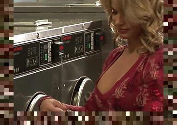 Kinky babe ravished in a laundromat by a couple of hunks