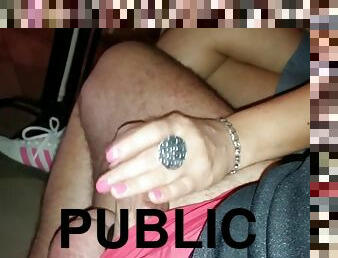 Public handjob under the table