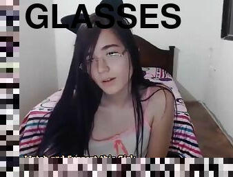 Pretty tgirl with glasses masturbates all alone