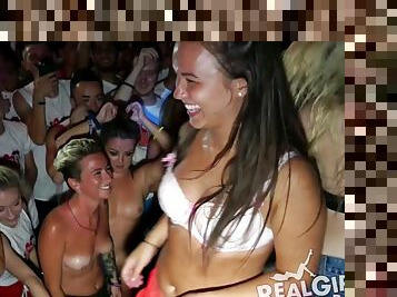 Topless dancing amateur girls at a spring break bar